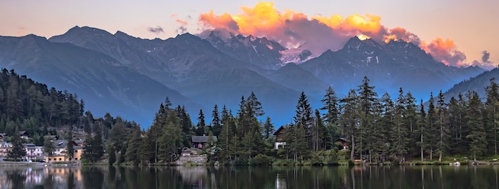 sunset behind mountains
